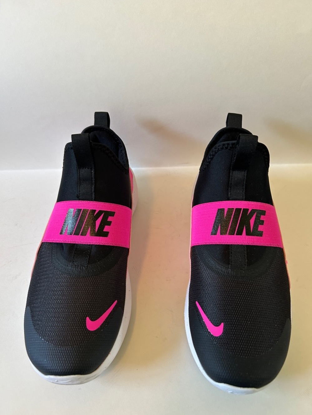 Nike Black Slip-On Sneakers with Hot Pink Accents